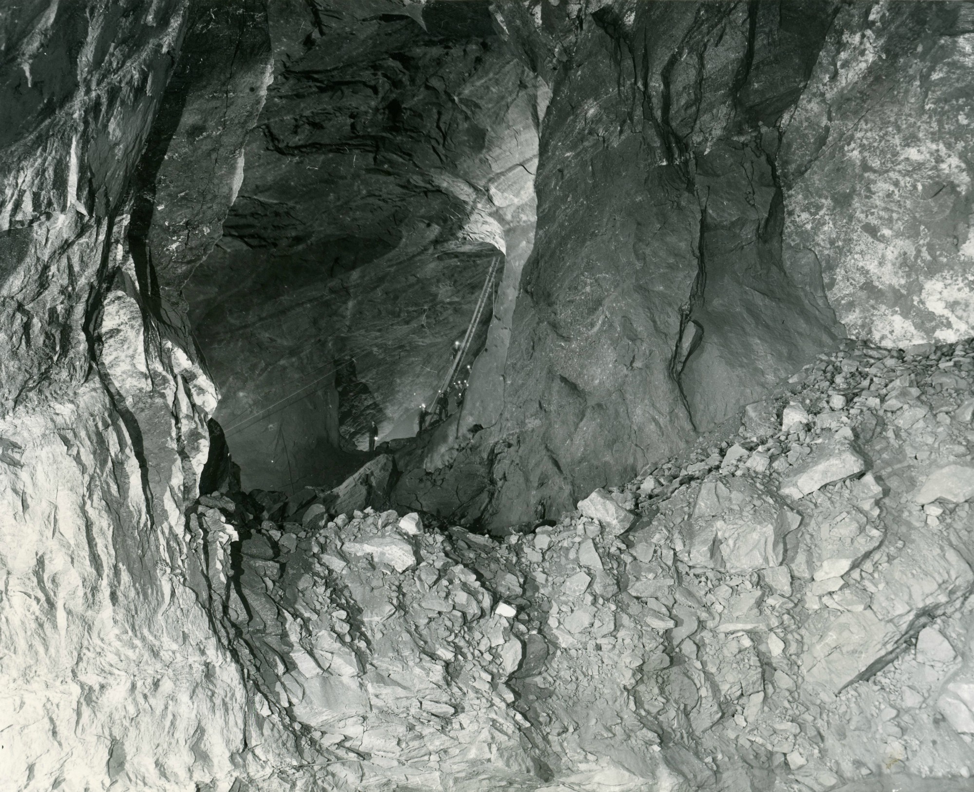 Raising ladders in a Republic Steel iron ore mine in Mineville