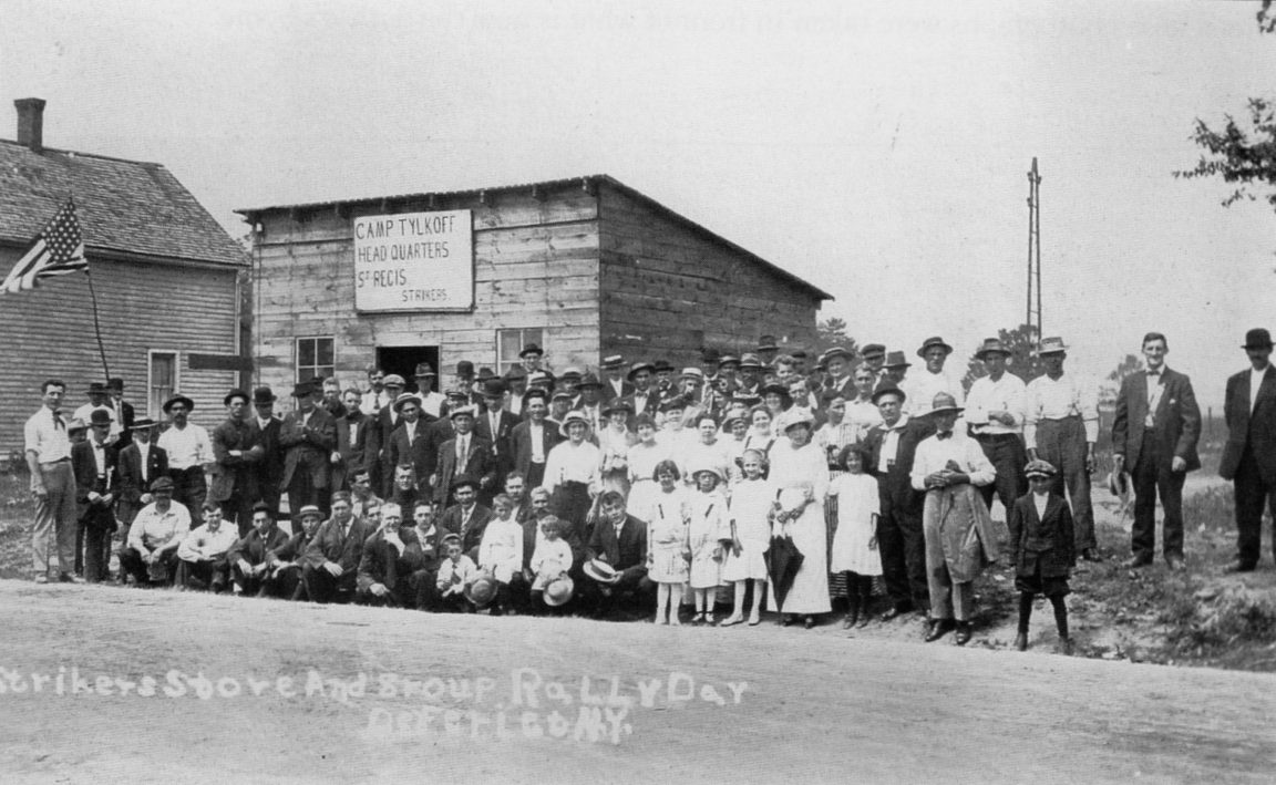 Striking paper mill workers and families in front of the strike office ...