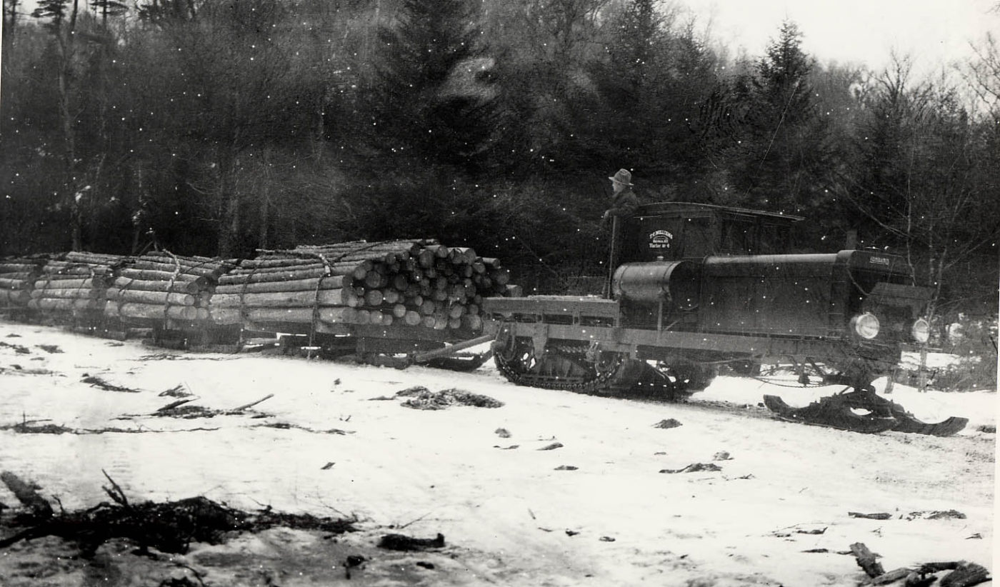 Hauling logs with a Lombard Log Hauler to Partlow in Long Lake