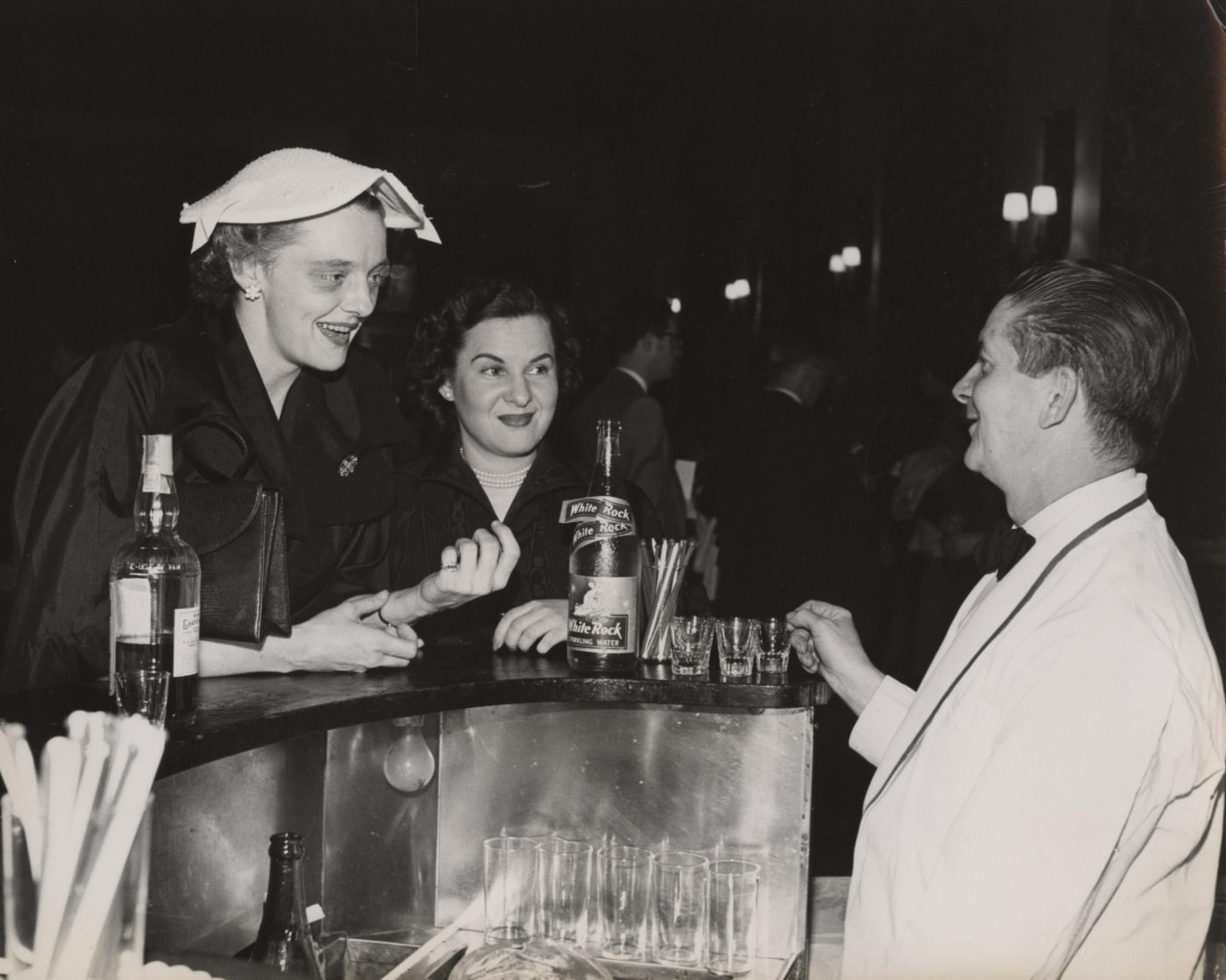 Two women at a bar in Saranac Lake