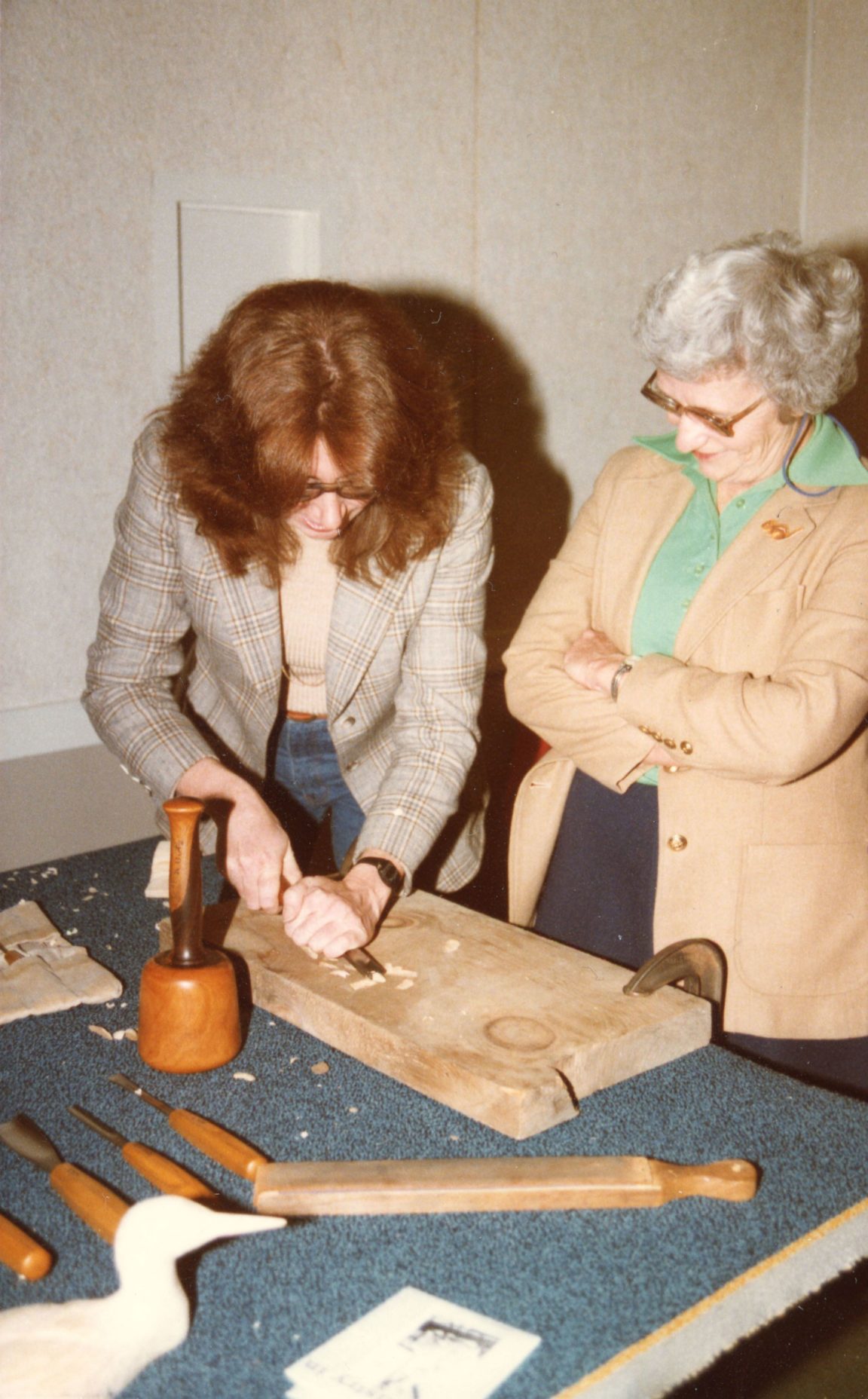 Woodcarvers Rick and Ellen Butz teaching a class at the Crandall Public